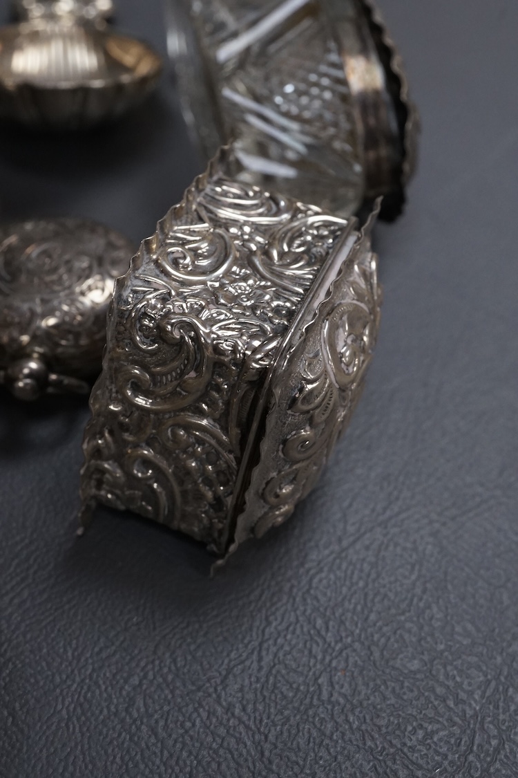 A Dunhill silver plated lighter and seven other items of collectable silver, including a modern silver caddy spoon by Pepper & Hope Ltd, a Victorian silver sovereign case, an Edwardian silver sovereign case, vesta case,
